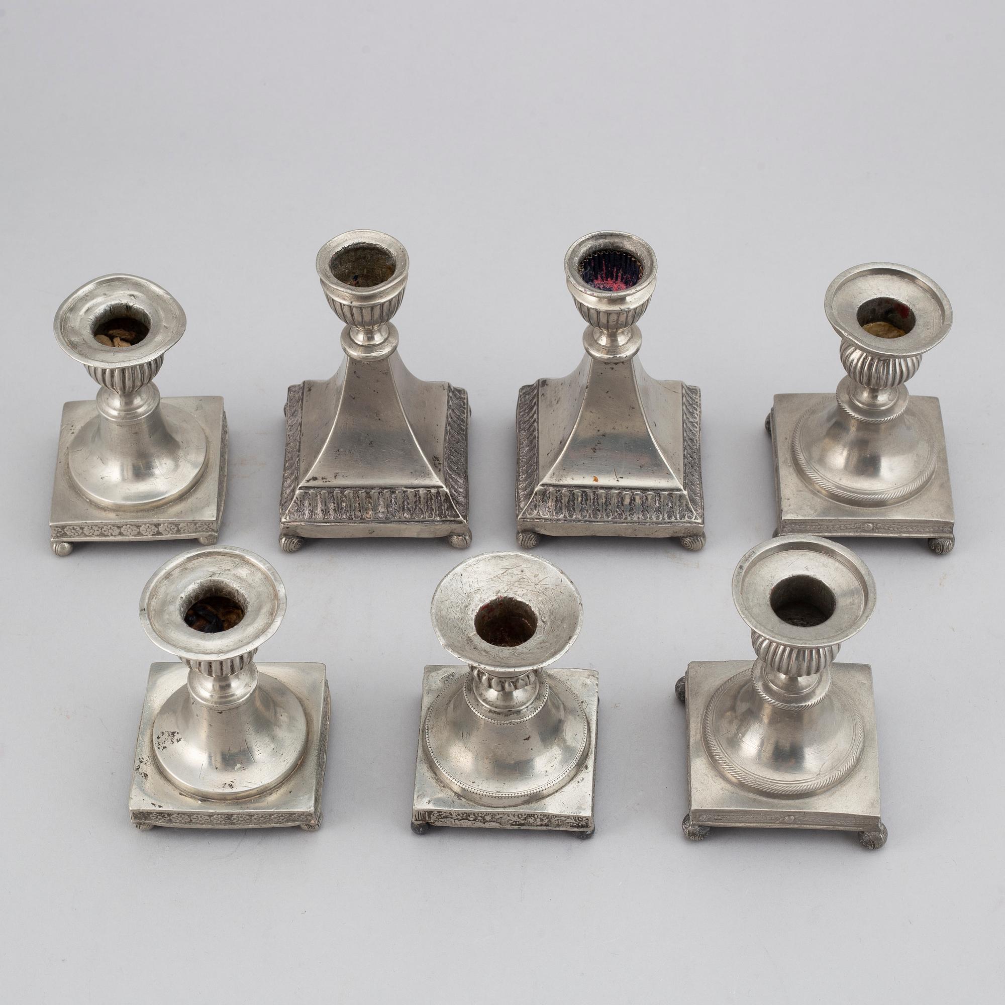7 pewter candlesticks, 19th Century. (2+2+2+1).