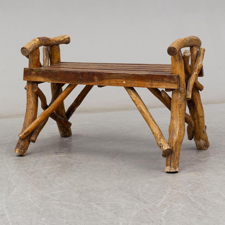 A garden sofa, table, bench and a pair of chairs, first half of the 20th century.