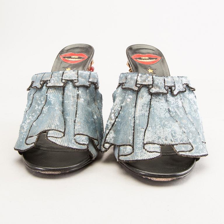 Gucci,.