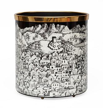 A Piero Fornasetti wastepaper bin, Milan, Italy.