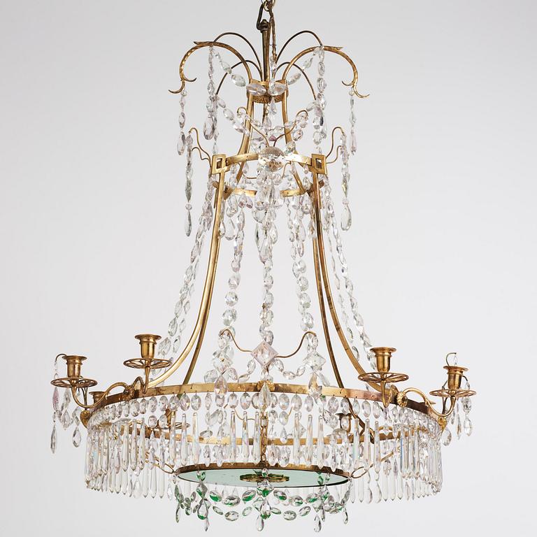 A German Louis XVI ormolu and cut-glass nine-light chandelier attributed to Johann Christoph Ermisch, late 18th century.