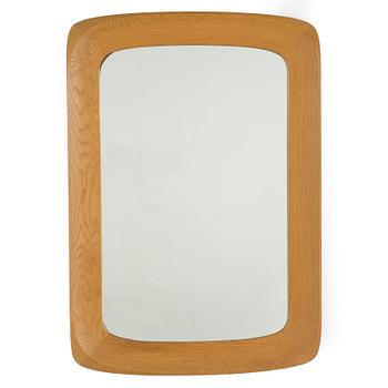 a mid- 20th-century oak mirror.