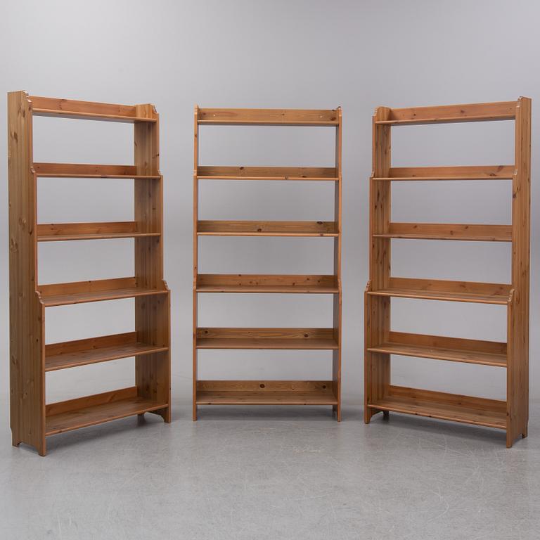 Three stained pine 'Leksvik' bookcases, IKEA.