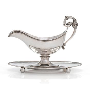 A French silver sauce boat,  1819-38. Maker's mark GJAB.