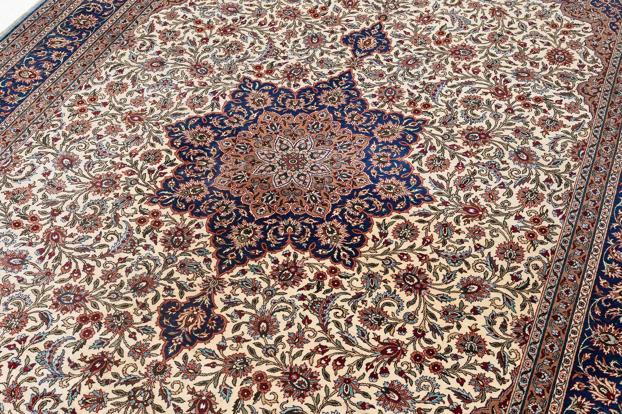 A silk Kayseri/Hereke carpet, c. 310 x 195 cm.