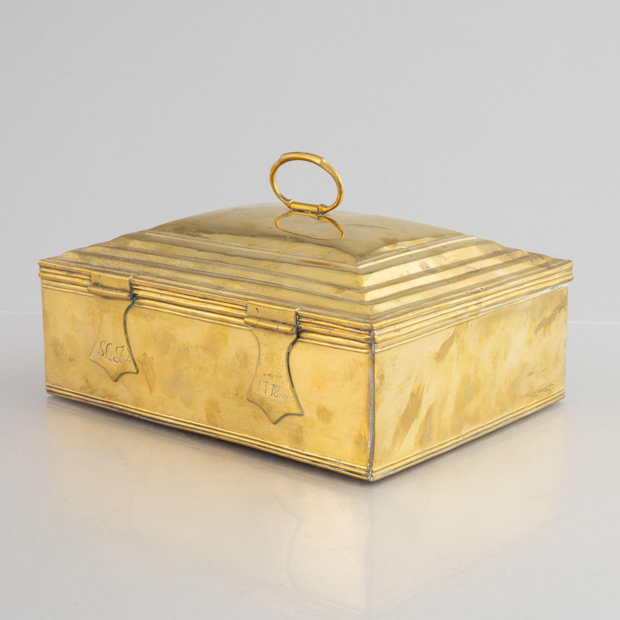 A Northern-European brass casket, dated 1778.