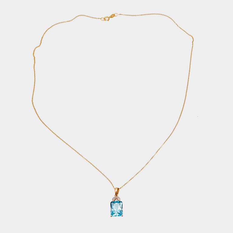 Halsband 14K guld med trappslipad blå topas och runda briljantslipade diamanter.
