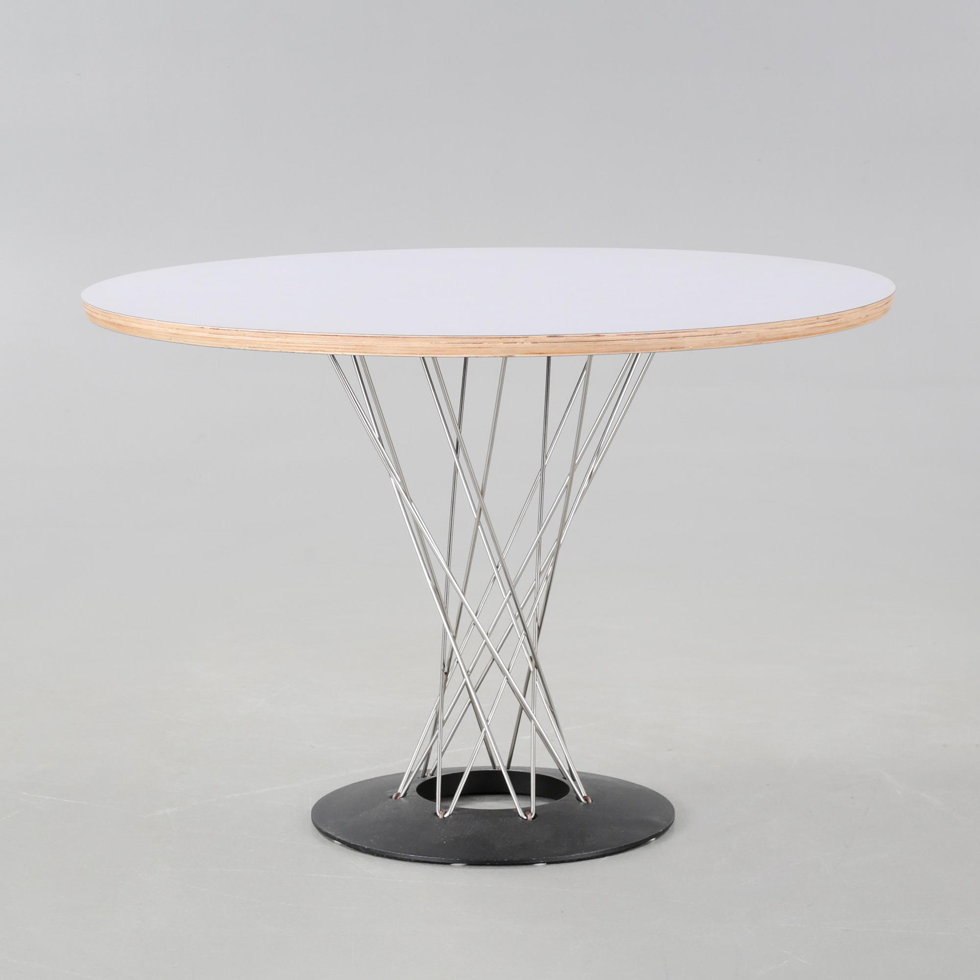 A "Cyclone" dining table, designed by Isamu Noguchi, Knoll.