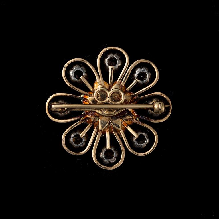 A BROOCH.