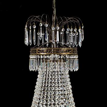 A 20th century empire style chandelier.