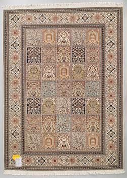 A Kashmir silk rug. Approx. 220 x 159 cm.