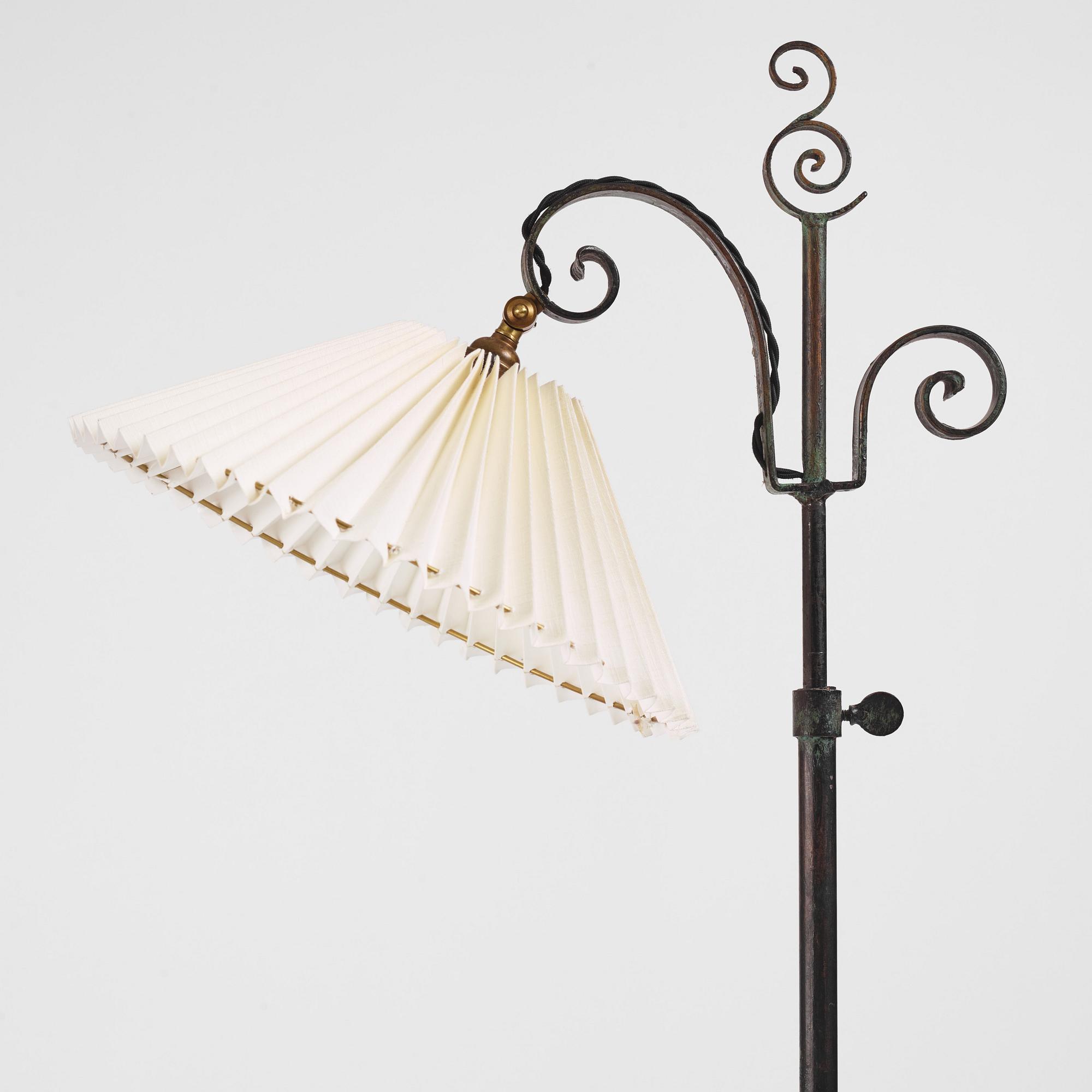 Harald Notini, a pair of wrought iron floor lamps, model "15101", Arvid Böhlmarks Lampfabrik, 1930s.