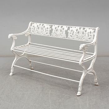 A cast iron garden sofa, empirestyle, circa 1900.