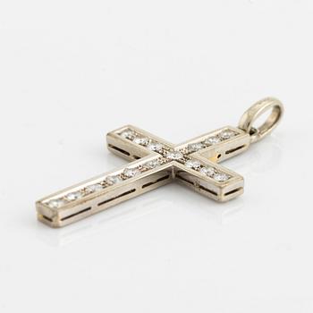 White gold and brilliant cut diamond cross pendant.