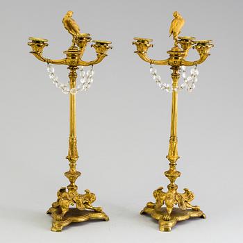 A pair of neorenaissance candelabras, about 1900.
