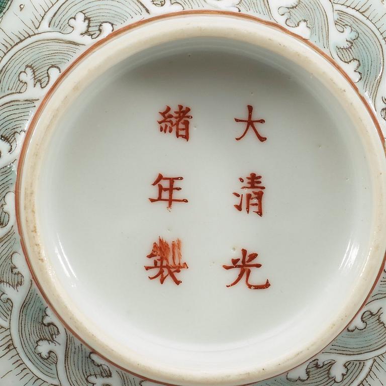 A set of three famille rose bowls with covers, Qing dynasty with Guangxu six character marks and period (1874-1908).