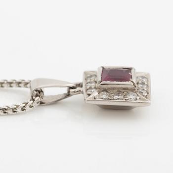 Pendant with chain in 18K white gold featuring a red stone, likely a ruby, and diamonds.