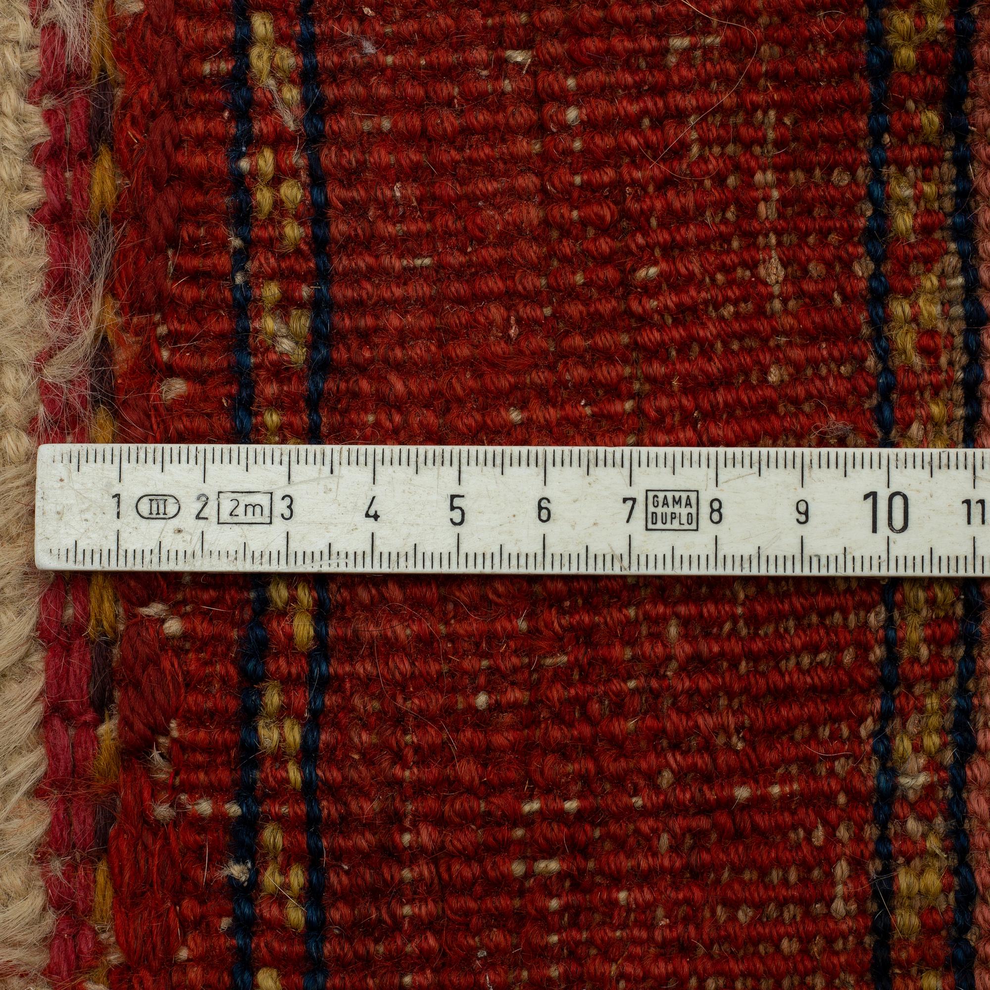 AN ANTIQUE BIDJAR CARPET, CA 374 X 224 CM.