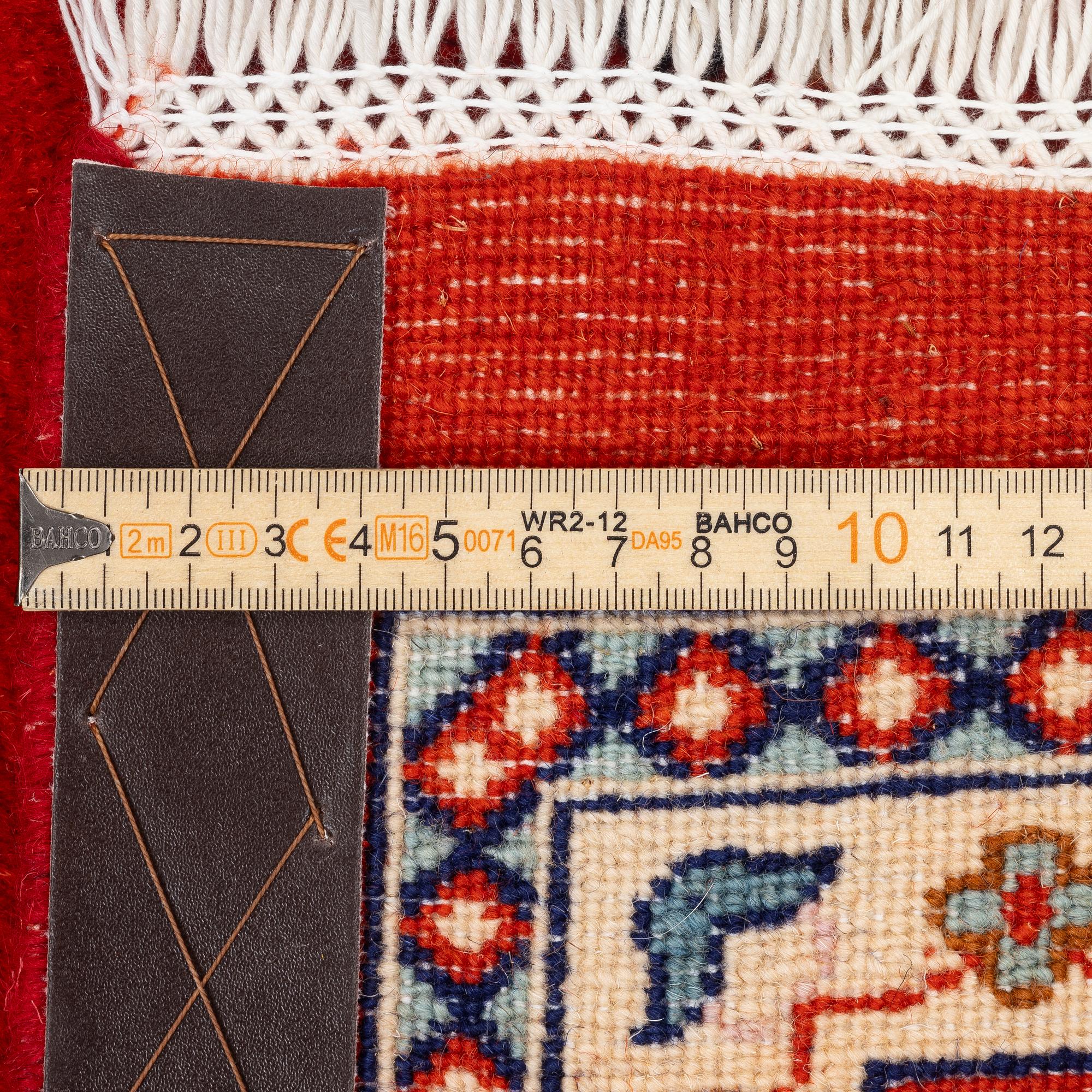 A Kashmar carpet, c. 236 x 168 cm.