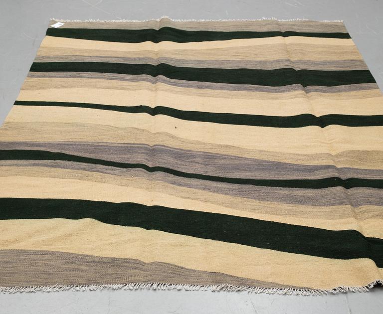 A CARPET, kilim, ca 291 x 197 cm.