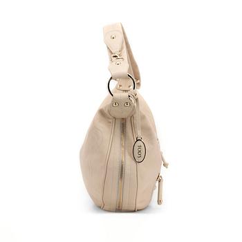 TOD'S. a light beige leather handbag.