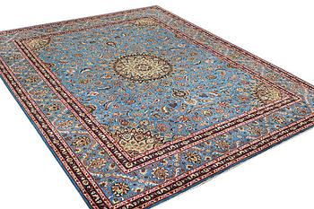 A Kashan carpet, a. 375 x 295 cm.