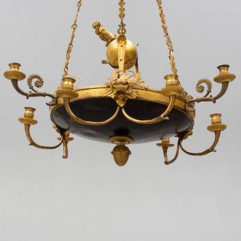 An Empire-style nine-light hanging lamp, late 19th century.