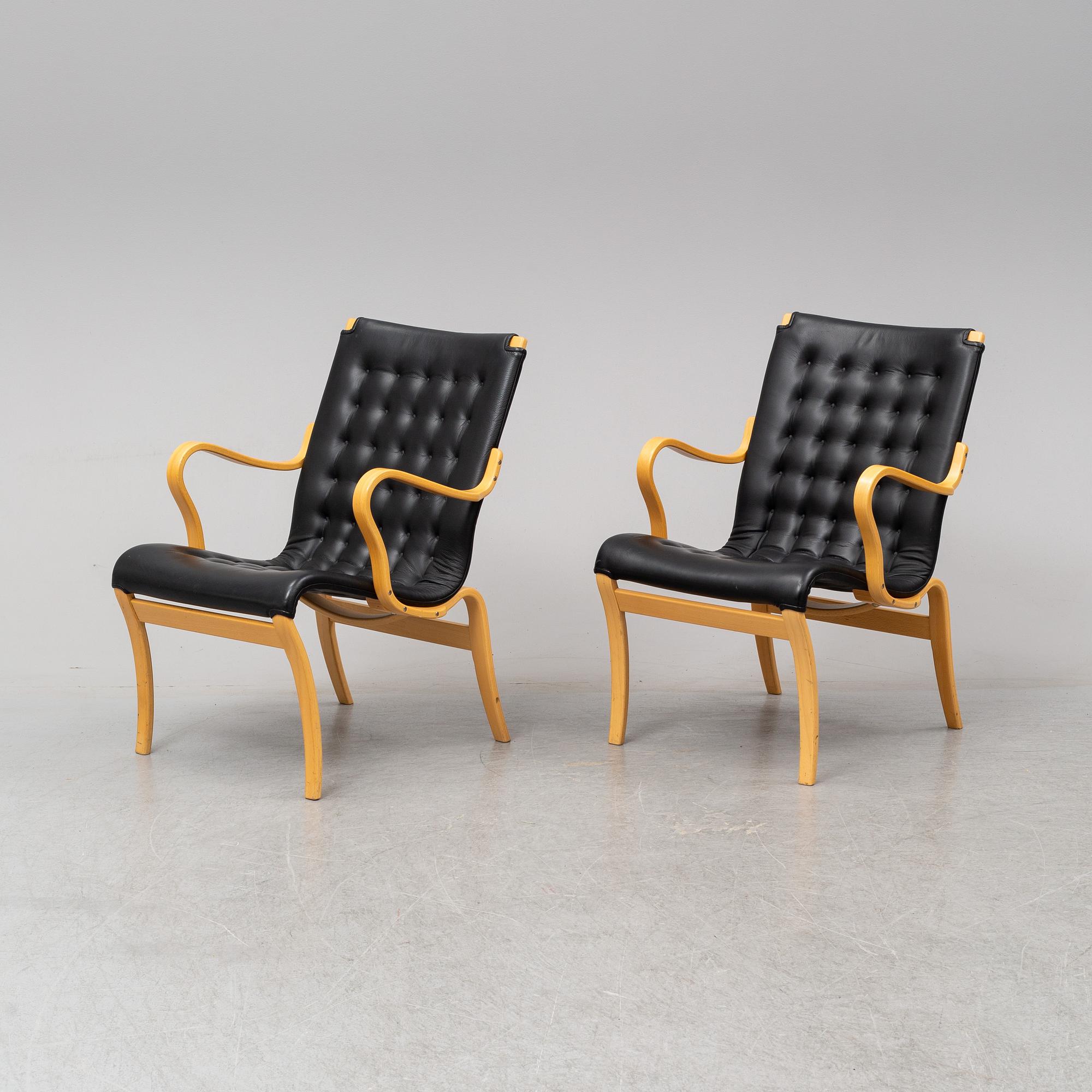 A pair of 'Mina' chairs designed by Bruno Mathsson, Bruno Mathsson International, Värnamo, Sweden.