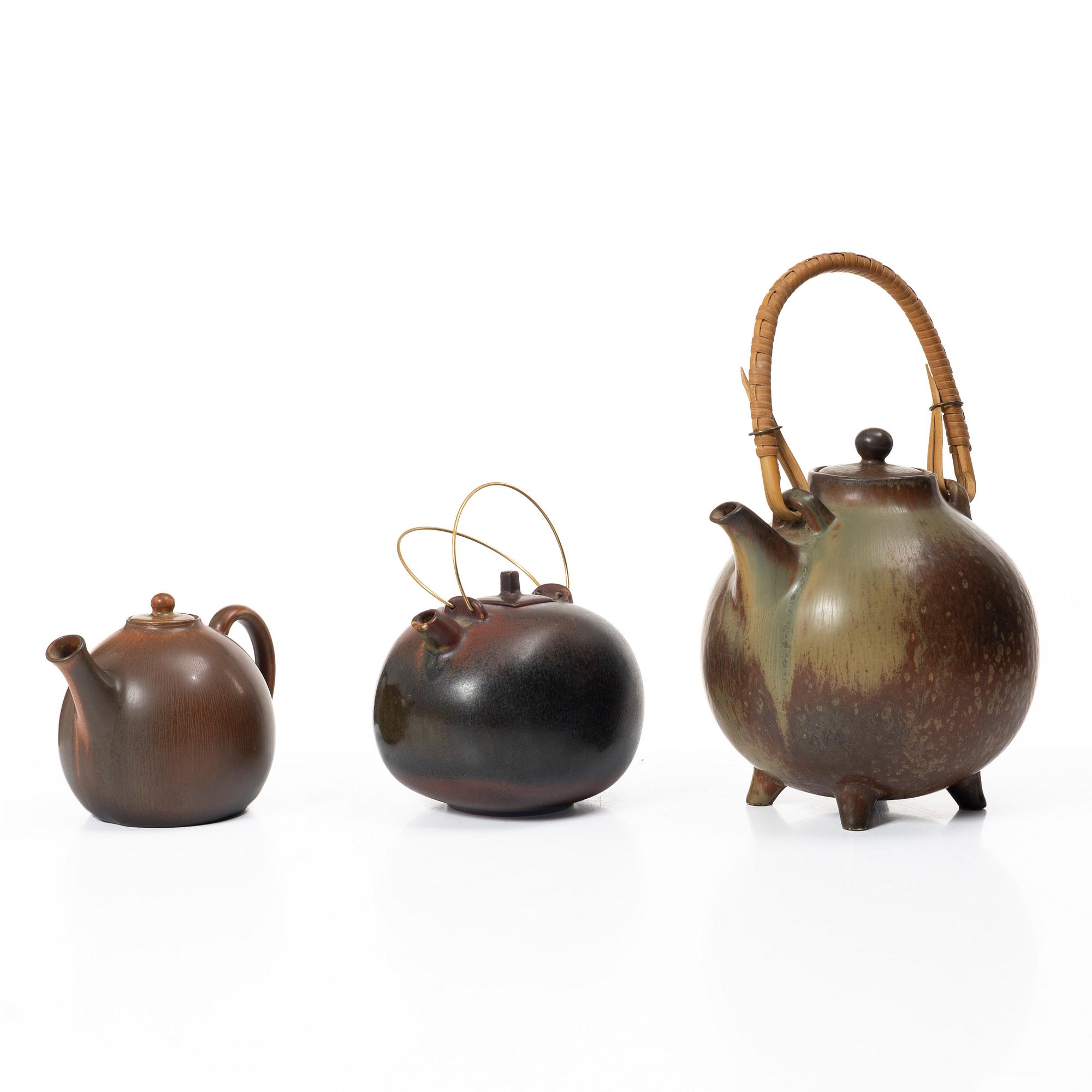 Gösta Grähs, , Gunnar Nylund and Carl-Harry Stålhane, three stoneware teapots, Rörstrand.