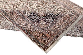 A carpet, silk Kashmir, c. 358 x 252 cm.