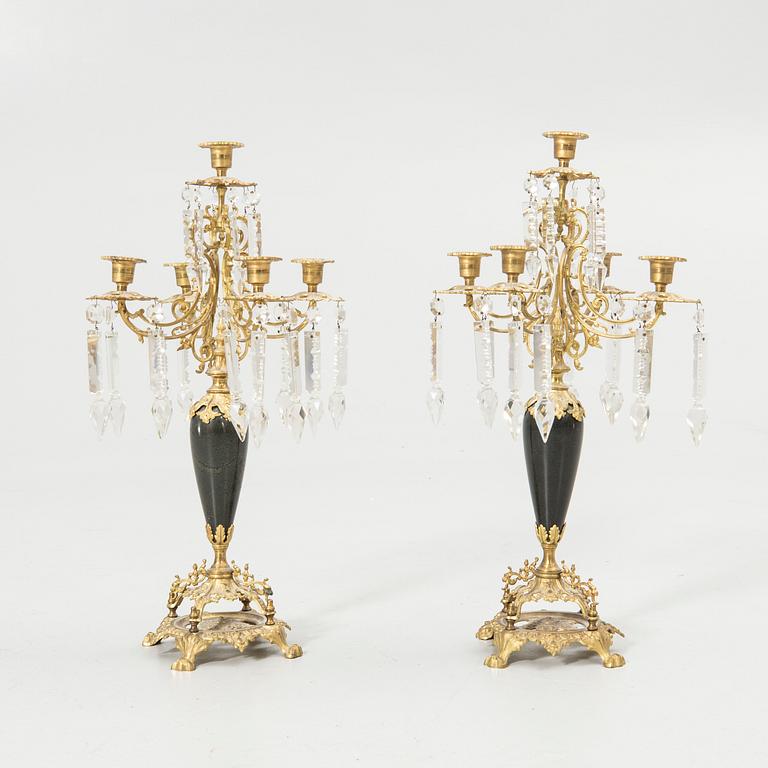Pair of candelabra and a firedog, 18th/19th century.