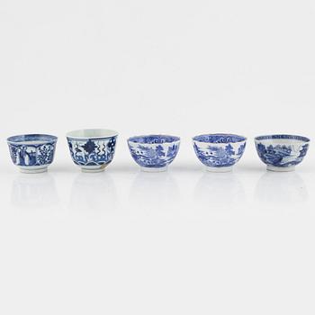 A group of thirteen cups, a bowl and a cup holder, four saucers, partly China and 18th century,