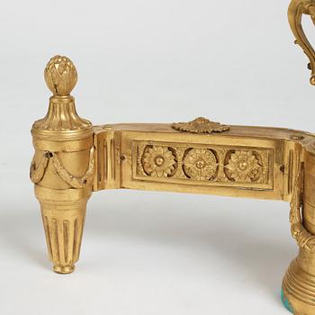 A pair of Louis XVI 18th Century bronze chenets.