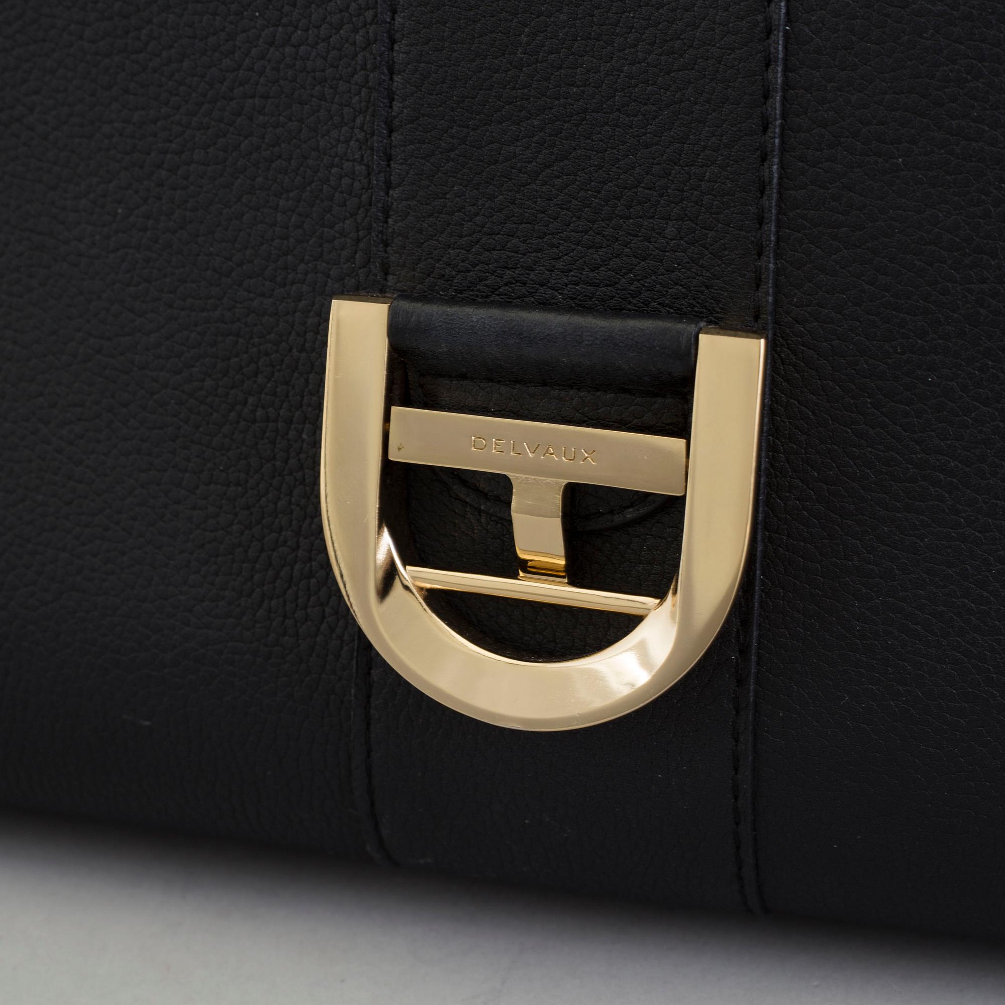 A Delvaux "Brillant" ladies handbag in black colored leather.