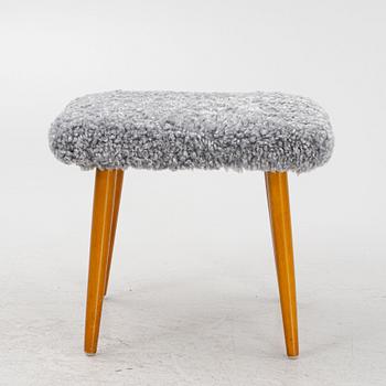 A sheepskin upholstered stool, second part of the 20th century.