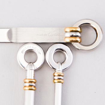 A PEN, CHAMPAGNE BEATER and BOOK MARK, must de Cartier.