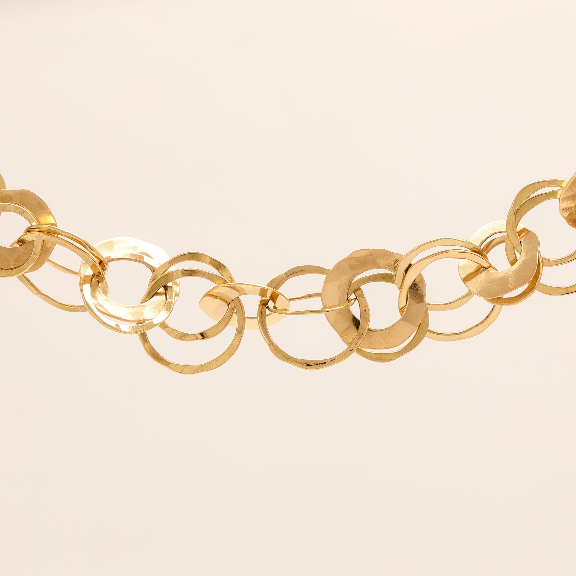 An 18K gold bracelet from Cusi Italy.