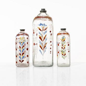 Three glass bottles, possibly Germany, 19th century.
