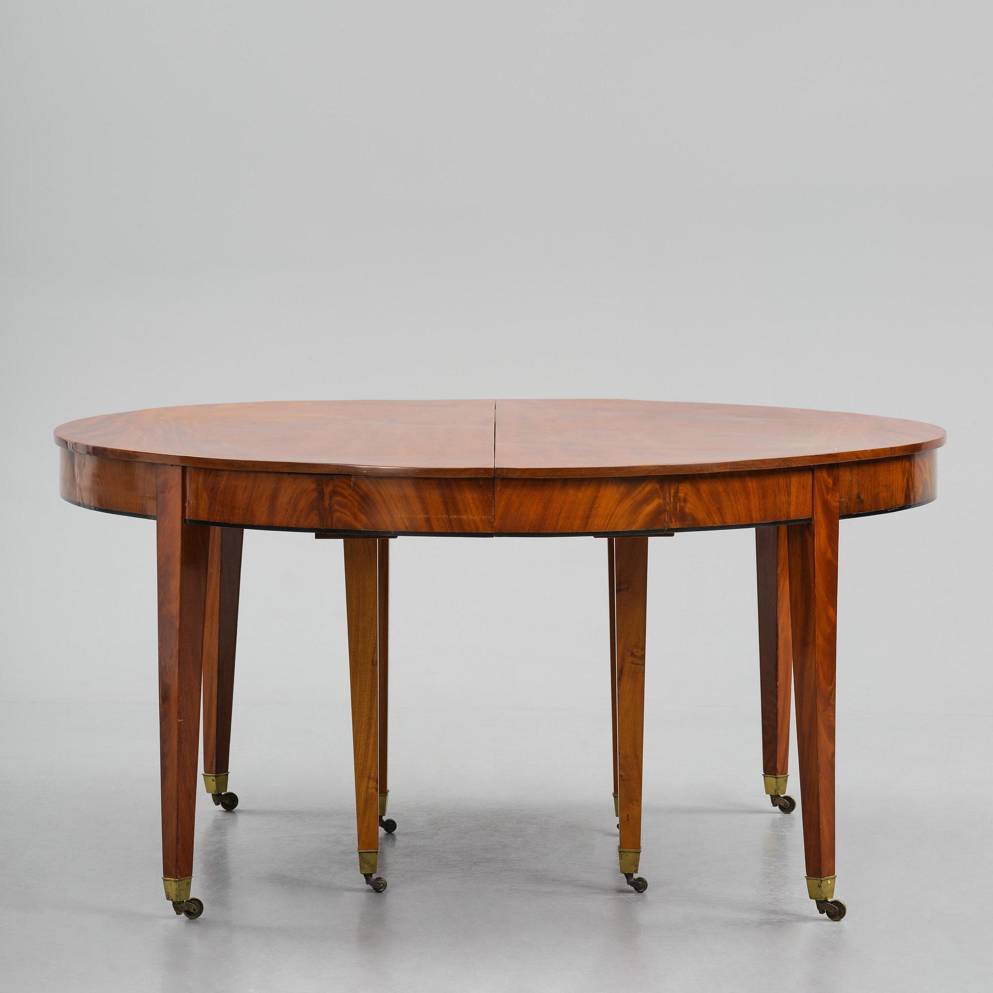 A George III mahogany D-end dining table, circa 1800.