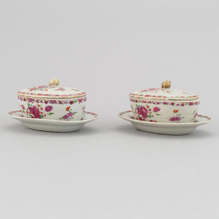 A pair of famille rose export porcelain butter tureens with dishes and covers, Qing dynasty, Qianlong (1736-95).