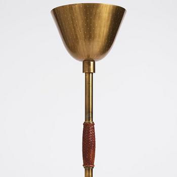 Carl-Axel Acking, a brass and leather floor lamp, designed for the Stockholm Association of Crafts in 1939.