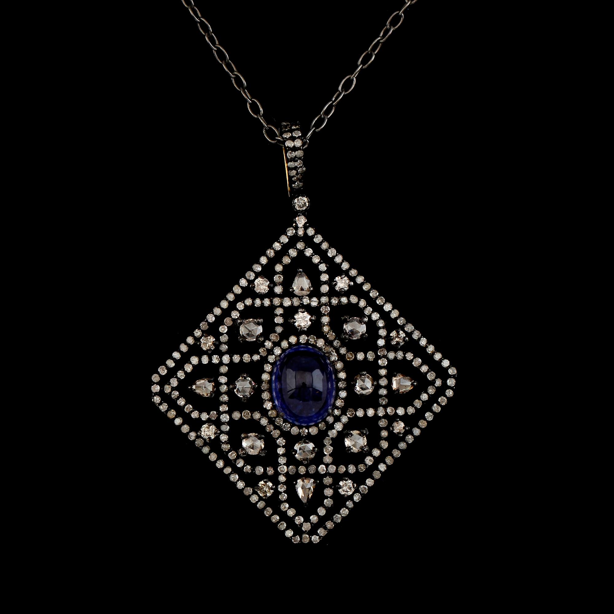 HÄNGE MED KEDJA, silver och 18K guld, tanzaniter tot ca 18.60 ct, diamanter tot ca 3.55 ct.