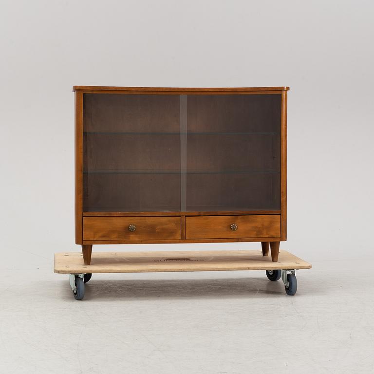 A Swedish Modern cabinet, 1940-50s.