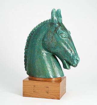 A Gunnar Nylund figure of a horse's head.