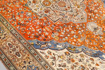 A carpet, Figural Tabriz so called Tabatabai, ca 390 x 268 cm.