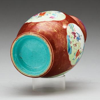 A coral ground famille rose vase, Qing dynasty.