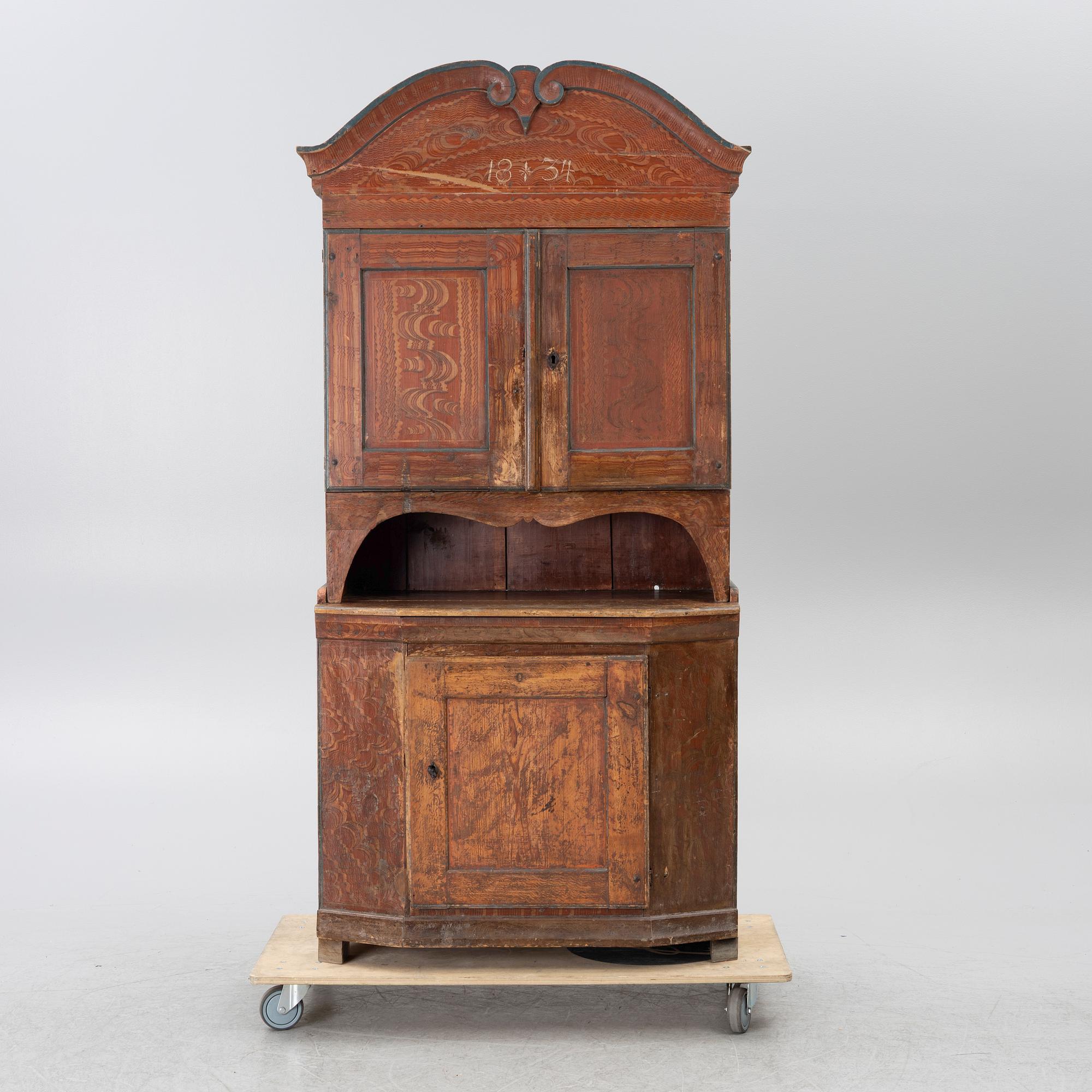 A 19th century Folk art gift cabinet.