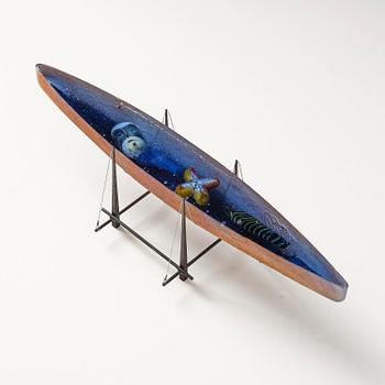 Bertil Vallien, a boat shaped sand cast glass sculpture,  Bullseye Glass Co., Portland, 1997.