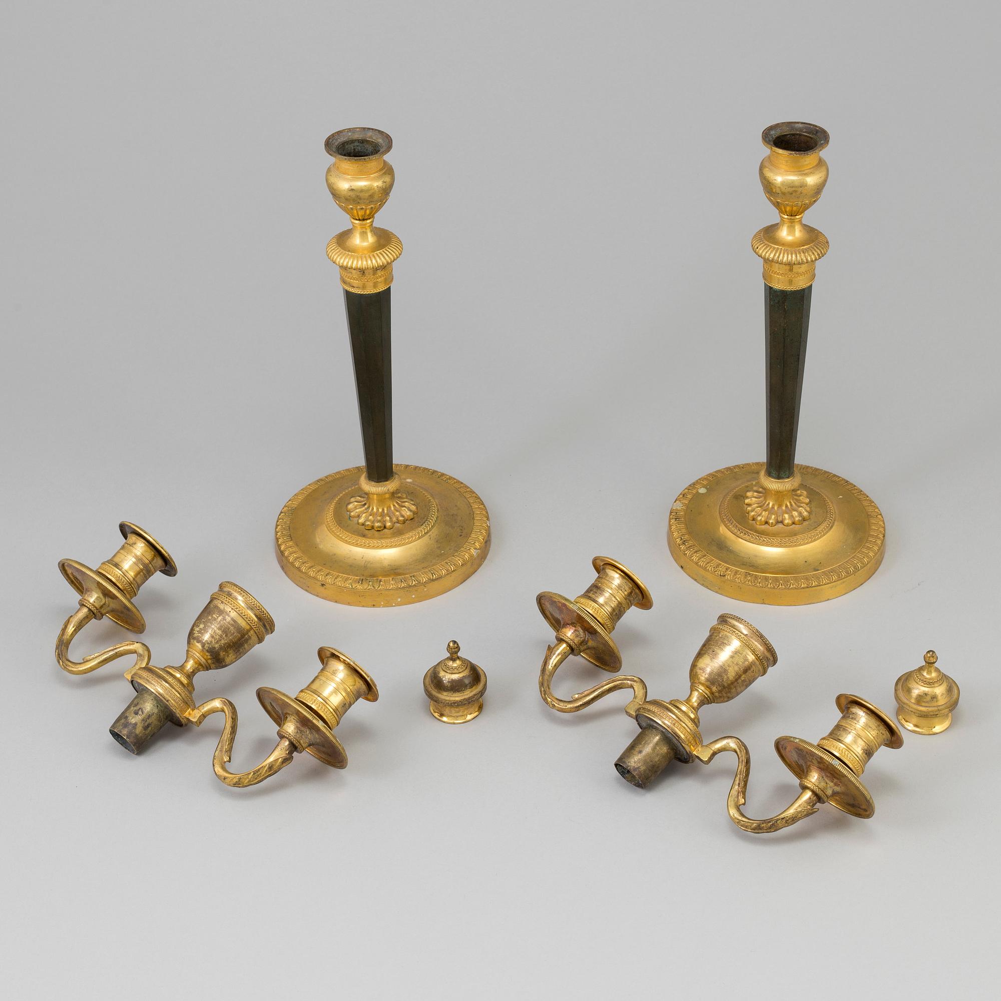 A pair of French Directoire late 18th century ormolu candelabra for three candles.