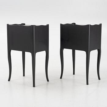 A pair of Rococo style bedside tables, second half of the 20th Century.